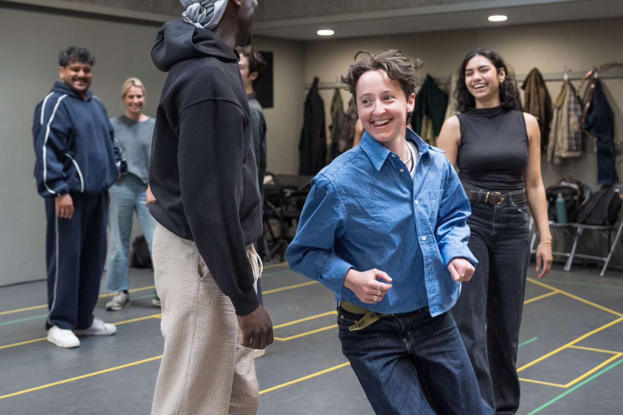 A Midsummer Night's Dream in rehearsals. Puck (played by G Bruce) prances around two lovers.